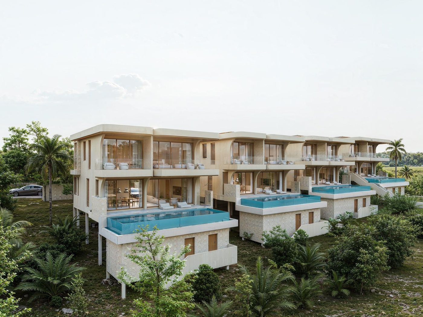 Exterior view of Alaya's hillside villa row above Chaloklum Bay, Koh Phangan